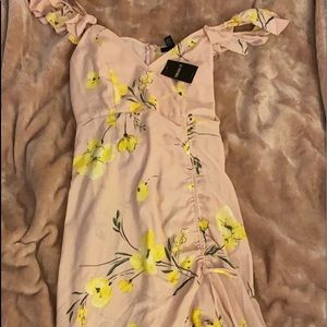 Floral print flowy dress.